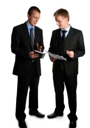 2 business men, standing, talking